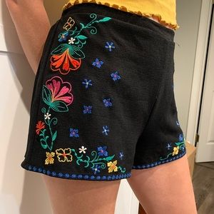 Black shorts with floral embroidery